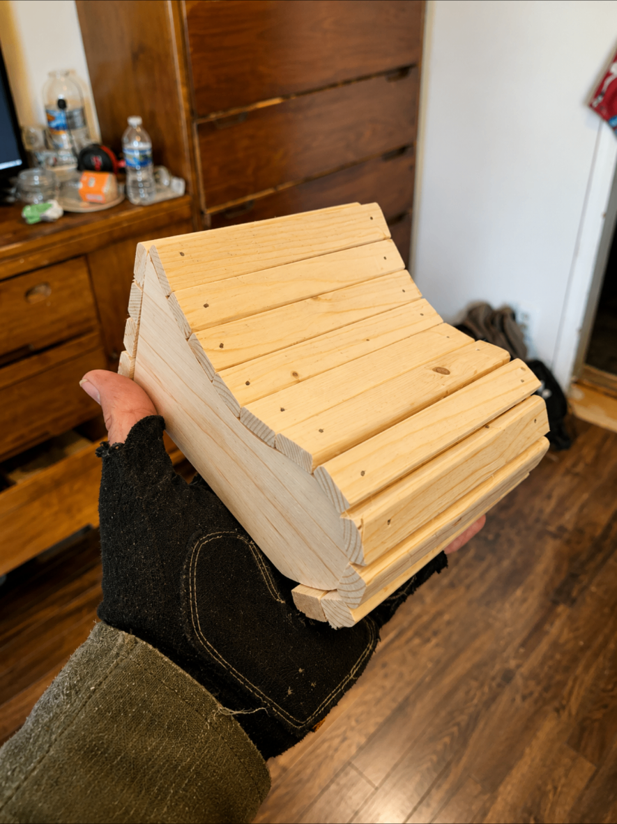 Small unfinished pine slatted chair
